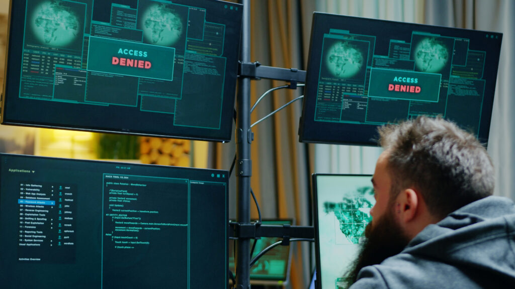 Hacker trying to bypass cybersecurity system
